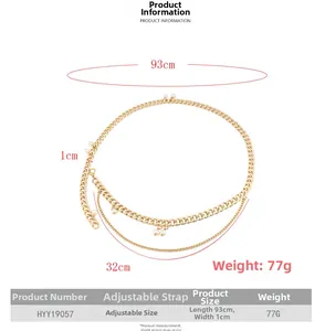 Detail view of a layered gold metal waist chain with pearls and size specifications