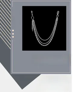 Close-up of triple-layered silver metal pant chain with hip-hop style fringe tassels