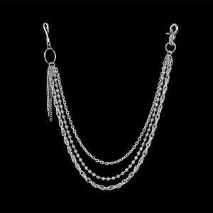 Close-up of triple-layered silver metal pants chain with varied link styles and dual hooks