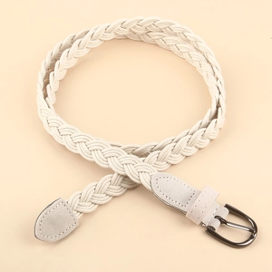 Macro detail of beige woven belt showing braided texture and matte leather edge finish