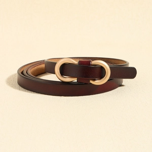 Minimalist dark reddish brown leather belt with matte gold double ring buckle design
