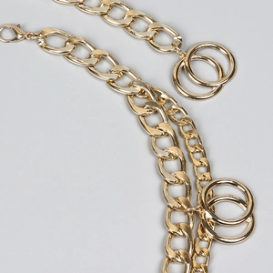 Elegant multi-layered gold geometric body chain with aluminum fringe waist tassels