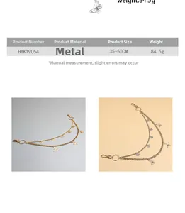 Close-up of double-layer golden waist chain with hollow butterfly charms for jeans