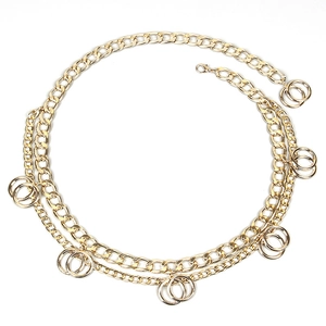 Multi-layer gold geometric body chain featuring chunky Cuban links and ring pendants