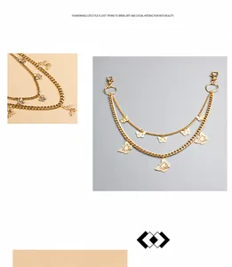 Detail of gold-plated double-layer metal pant chain with hollow butterfly pendants
