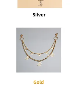 Close-up of double-layered gold and silver butterfly waist chains with lobster clasps