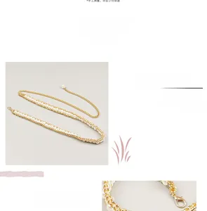 Detail view of the elegant gold pearl chain belt with metal weave and adjustable lobster clasp