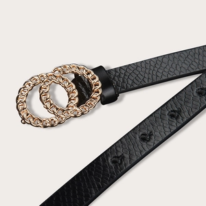 Close-up of black snake texture belt with golden double O interlocking metal buckle