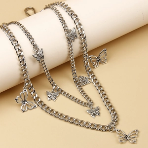 Double-layered silver butterfly pants chain with Cuban link charms for vintage styling
