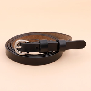 Slim black leather belt for women featuring a polished silver horseshoe buckle and smooth finish
