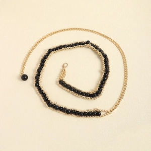 Elegant gold metal chain belt with black beads and pendant for women's fashion outfits