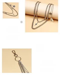 Silver multi-layer waist chain featuring lightning bolt charms and engraved round pendants