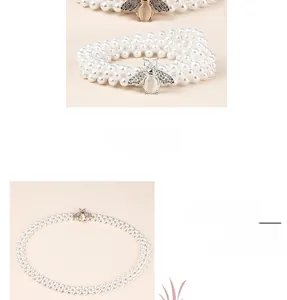 Détail macro de la ceinture en perles à trois rangs avec boucle abeille et cristaux