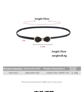 Vue détaillée d'une fine ceinture noire avec boucle papillon dorée de 6,5cm et bande de 1cm