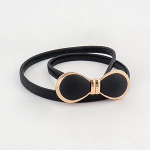 Ceinture élastique fine pour femme avec boucle dorée en forme de nœud et incrustation noire