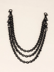 Detailed view of triple-layered gunmetal punk pants chain with matte black lobster clasps