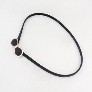 Ceinture élastique fine noire pour femme avec boucle nœud en métal doré chic