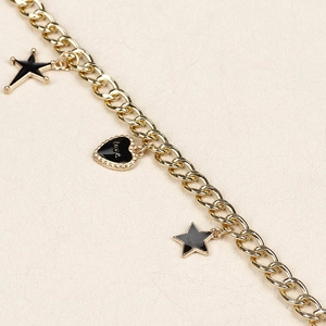 Hip hop style gold pant chain with black enamel star and heart love pendants for women