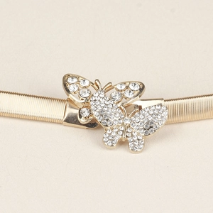 Elegante cintura elastica dorata da donna con fibbia a farfalla e cristalli brillanti