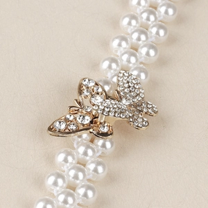 Elegante cintura a due file di perle con fibbia a farfalla in strass dorati