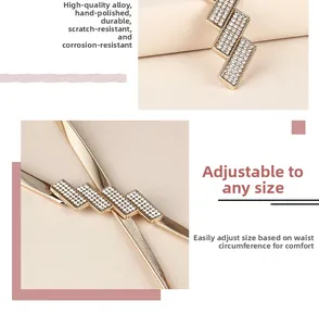 Detail of gold metal waist chain with rhinestone buckle and adjustable spring strap