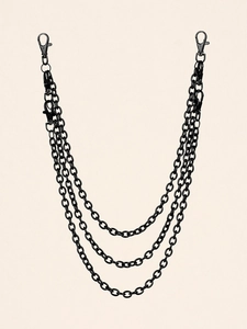 Detailed view of triple-layered gun black metal waist chains with lobster clasps