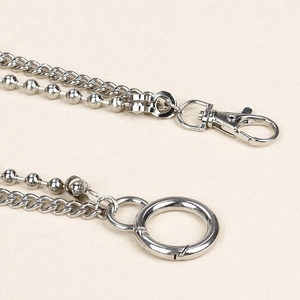 Double-layered silver metal pant chain featuring flat curb and bead link designs
