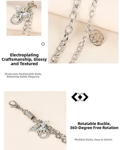 Detail of multi-layer trousers chain featuring a dragon pendant and 360-degree swivel hook