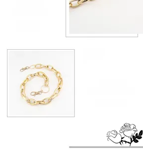 Detail of gold punk trousers chain featuring 360-degree rotating lobster clasps