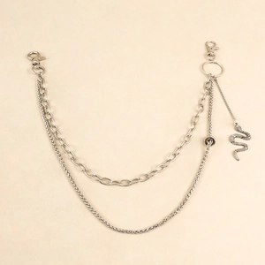 Detail of silver double-layered pants chain with snake pendant and lobster clasps