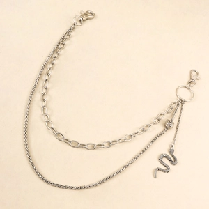 Close-up of double layer silver trouser chain with snake pendant and round ring clasp