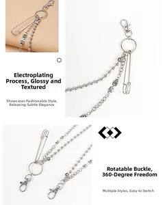 Detail of multi-layer silver metal pants chain with skull pendant and flexible swivel clasp