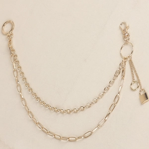 Double-layered gold pants chain featuring a metal padlock pendant and ring details