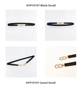 Close-up of thin black elastic waist belt for women with elegant golden round buckle detail