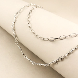 Silver punk style paperclip and barbed wire link chain necklace with polished finish