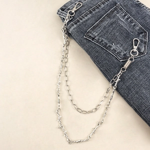 Gothic double layer silver pants chain with barbed wire links on grey denim jeans