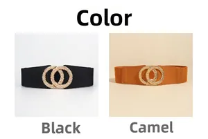 Detail of elastic waist belts in black and camel with golden double-circle metal buckles