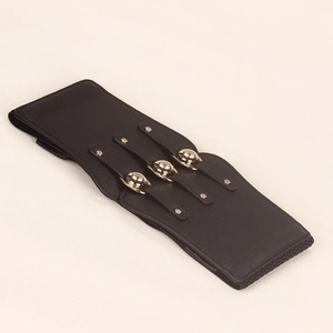 Close-up of black wide elastic waist belt featuring golden spherical buckles and lychee texture