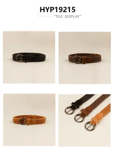 Detail view of woven elastic belts with vintage metal round buckles in black and brown