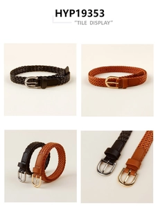 Macro view of detailed leather weave texture and metal D-ring buckle of the braided belt