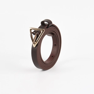Detail view of dark brown leather belt with a minimalist golden triangle buckle