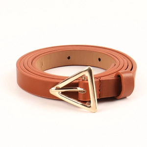 Close-up of a women's slim brown leather belt featuring a classic gold triangular buckle