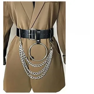 Detail of black punk waist belt with silver metal rings and triple-layered chains