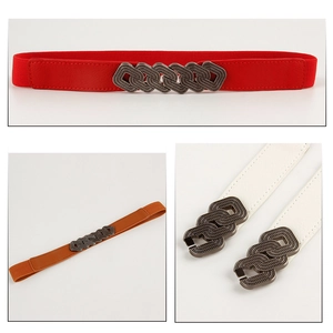 Detail view of elastic waist belts in red, brown, and white with metal chain buckles