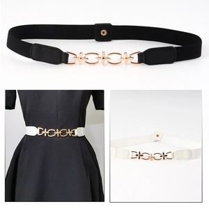 Detailed view of elastic belt featuring a golden hollow four-leaf clover buckle for women