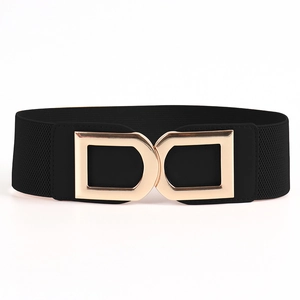Close-up of black elastic waist belt featuring a shiny gold double D interlocking buckle