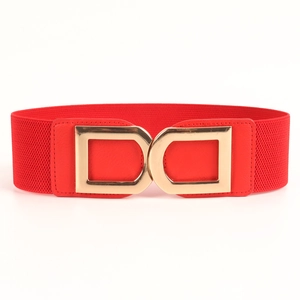 Detail of red elastic waist belt featuring a gold Double D metal buckle and leather trim