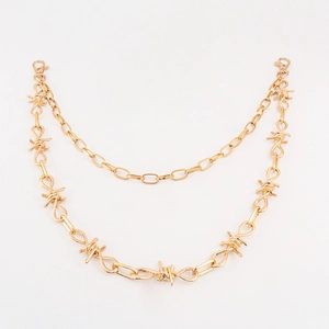 Dubbellaagse gouden punk broekketting met doornschakels en stevige metalen karabijnsluitingen
