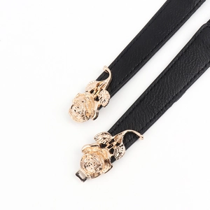 Ceinture élastique noire pour femme avec boucle rose dorée et texture cuir grainé