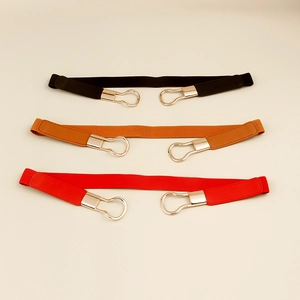 Three-pack elastic skinny waist belts for women in black, brown, and red with gold buckles